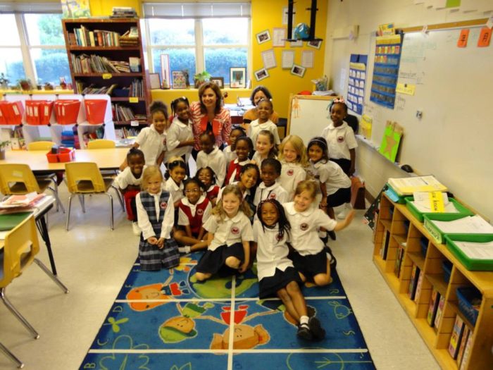 international visitor with Atlanta school children